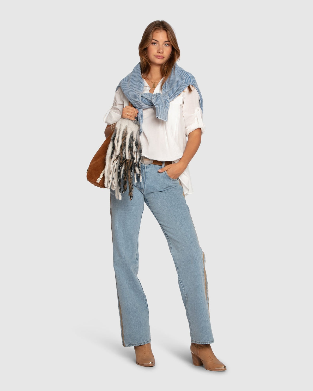 White Catch Feelings Pintuck Shirt with relaxed silhouette and V-neckline - front view
