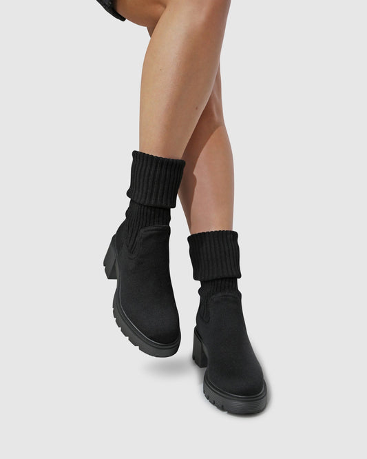 Black Tokyo Lights Rib Sock Boot with oversized silhouette and ribbed texture - front view