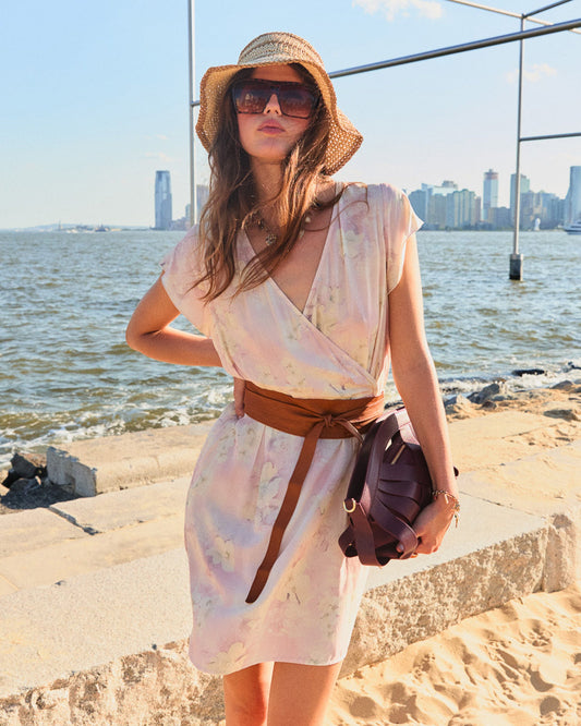 Pink I'm The Star Wrap Dress with wrap front and zip closure - front view