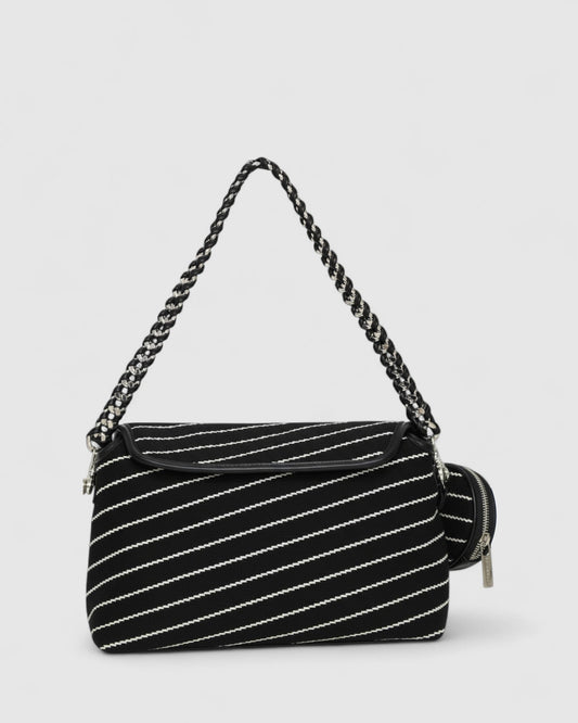 Black/White Elodie Day PU Bag with flap-front design with magnetic snap closure and woven chain shoulder strap for a