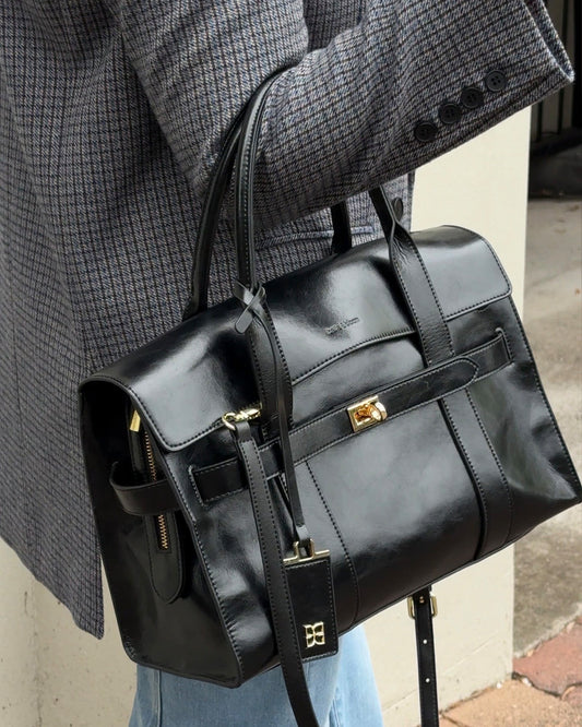 Black So What Tote Bag with adjustable straps and top handle - front view