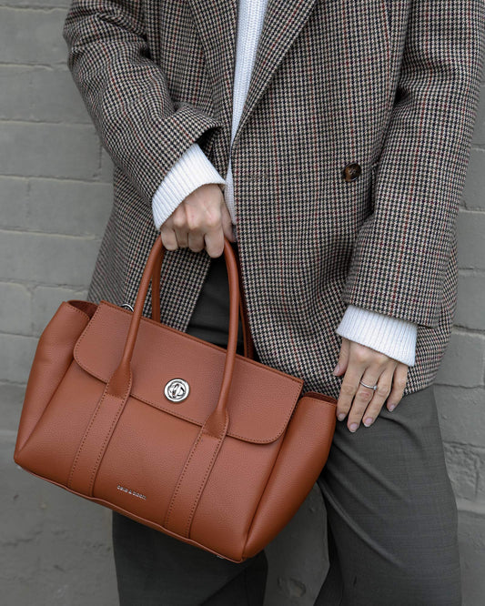 Tan The Regent PU Bag with adjustable straps and top handle - front view