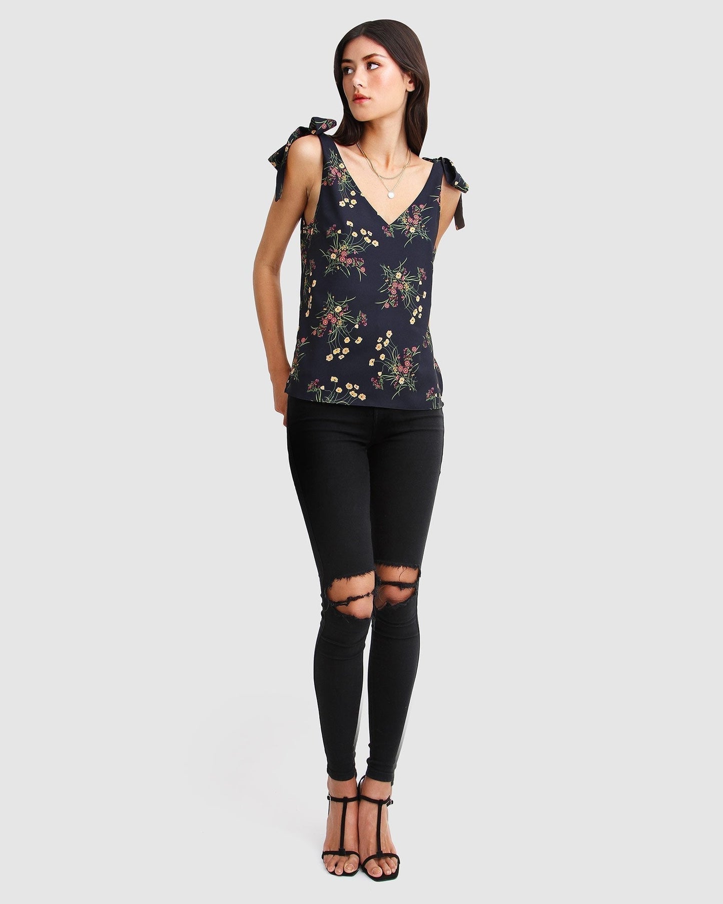 feel-for-you-navy-print-v-neck-top-full-body_23cbd1bc-bd8c-49d5-81ff-bb0f9d4ec8d8.jpg